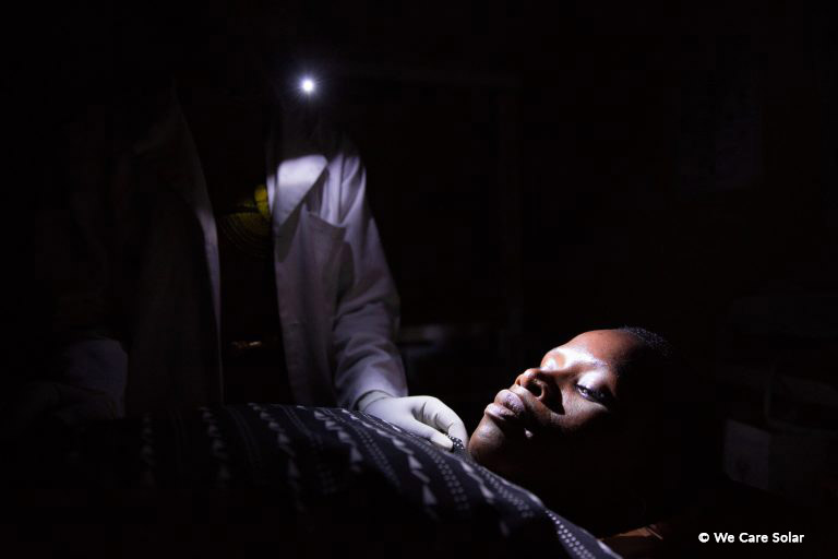 Tanzania midwife works in dark